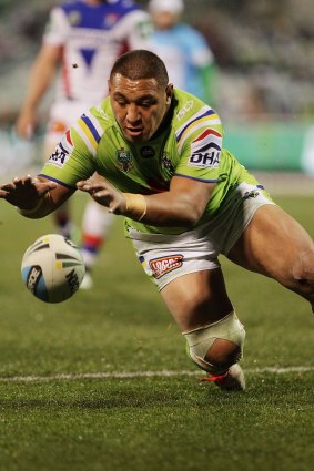 Josh Papalii scores against the Newcastle Knights on Friday.