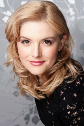 With honey: Lucy Durack flies in as Glinda the good witch in Wicked.