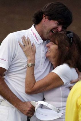 Overwhelmed ... Bubba Watson cries tears of joy with his mother following his US Masters triumph.