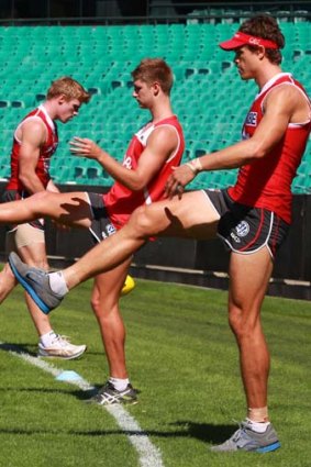 Swanning about: Mike Pyke (right) makes the most of every training session.