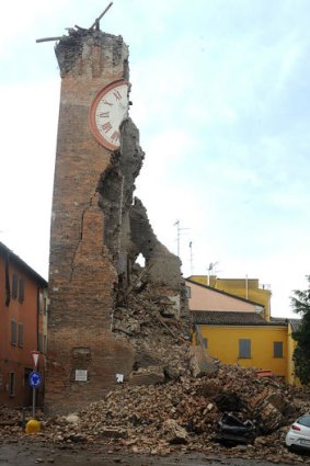 An old clock-tower barely manages to stay standing.