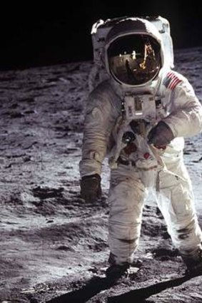 Buzz Aldrin on a 1969 moon walk: He's still going and so are brokers.