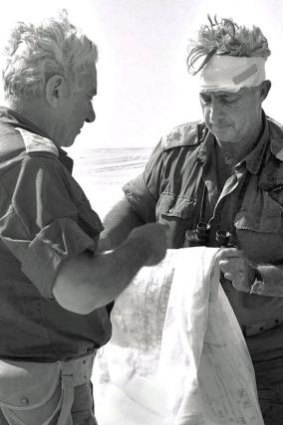 Another world: Former Israel premier Ariel Sharon (right) during the Arab-Israeli war in October 1973, which changed the lives of those in the kibbutz.