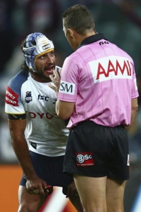 Rough trot: Thurston argues with ref Shane Hayne after a controversial defeat to Manly in the 2012 finals.