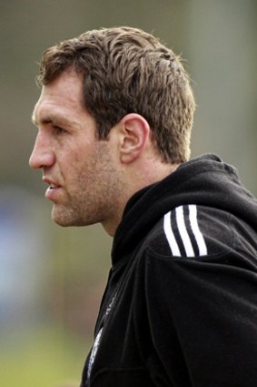 Travis Cloke watches as Collingwood train yesterday.