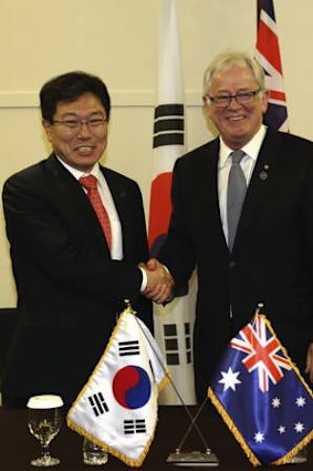 Trade Minister Andrew Robb and his South Korean counterpart, Minister of Trade, Industry and Energy Yoon Sang-jick.