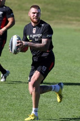 Regaining his balance: Josh Dugan trains with the Dragons during the week.