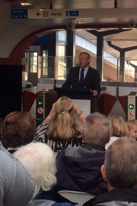 Premier Colin Barnett opens the Butler Train Station.