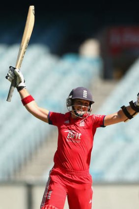 Arran Brindle of England celebrates scoring the winning run to give England victory over Australia in game one.