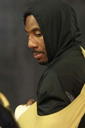 New York Knicks forward Amare Stoudemire with his hand in a sling.