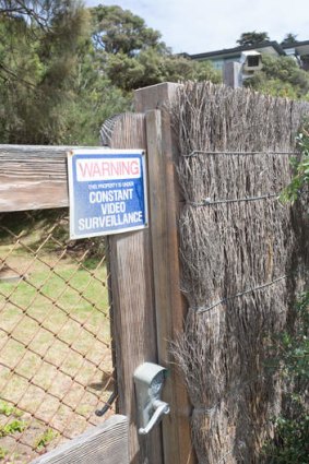 No way: A locked gate bars the beach access through Lindsay Fox's property.