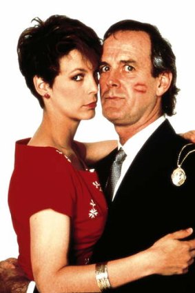 John Cleese with Jamie Lee Curtis in <i>A Fish Called Wanda</i>.