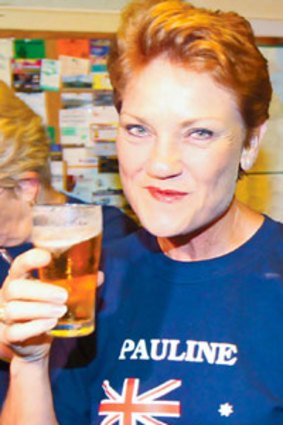 Here's looking at you: Pauline Hanson after Saturday's election result. She is suing News Limited for defamation over the publication of nude photos.