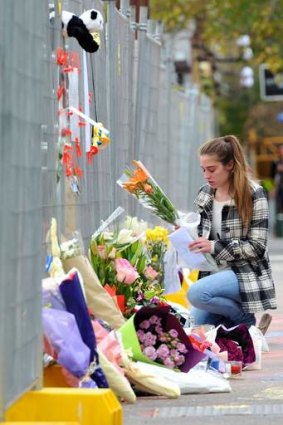 Tributes have been made to those killed in the wall collapse on Swanston street.
