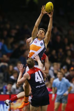 Flying high: Nathan Wilson of the Giants soars to mark the ball.