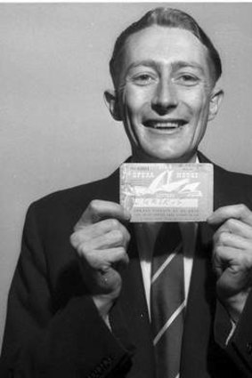 Mr R Faulder, holding his winning ticket in the fourth lottery in 1958.