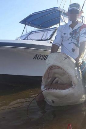 Huge shark: Ben shows off his catch.