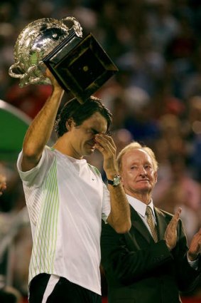 Tennis legends: Roger Federer, in tears, with Rod Laver after the 2006 Australian Open.