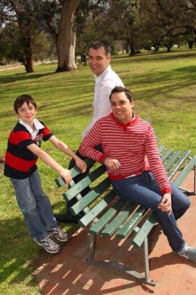 Conference organiser Wayne Elliott (centre), with son Joshua and partner Peter Ellis, says parenting has been an emotional roller-coaster.