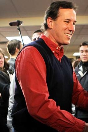 Nothing up my sleeves &#8230; the Republican presidential candidate Rick Santorum shows off his penchant for sleeveless jumpers during a speech at Ford Dodge, Iowa.
