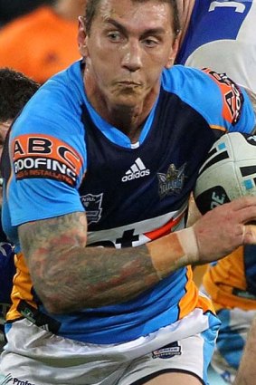 Pivotal role . . . Mat Rogers for the Titans.