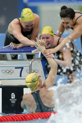 Kylie Palmer, left, celebrates gold in Beijing with Bronte Barratt, Stephanie Rice and Linda Mackenzie.
