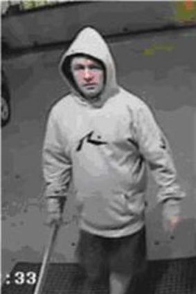 Police have released images of the man wanted in connection to a brothel robbery in Bowen Hills.