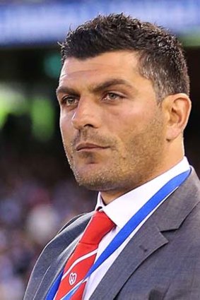 John Aloisi has shot to the top of the bookies' board as favourite to win the sack race.