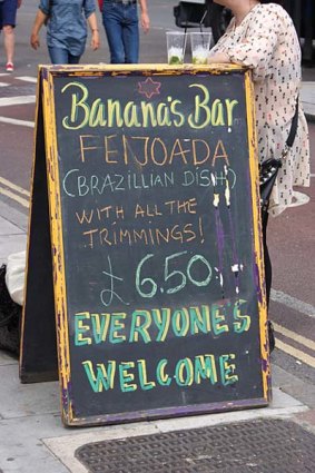 A cafe advertises its Brazilian dishes.