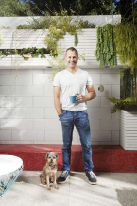 Landscape architect Brendan Moar at home in Chippendale with his dog Hughie.