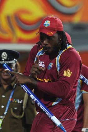 Chris Gayle, souvenir stump in hand, dances to his own beat after the West Indies entered the final.