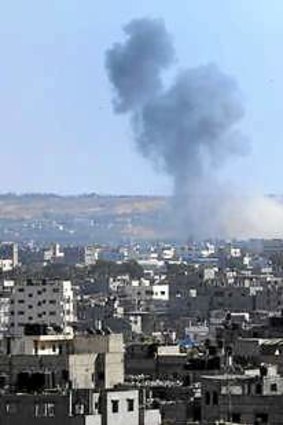 Smoke rises after an Israeli missile strike hit the northern Gaza Strip on Thursday.