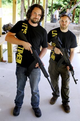 American Owen Martin is the owner of Snake Hound Machine, a gunsmith that specialises in Kalashnikov rifles. He is pictured with a friend at a firing range in New Hampshire, US.