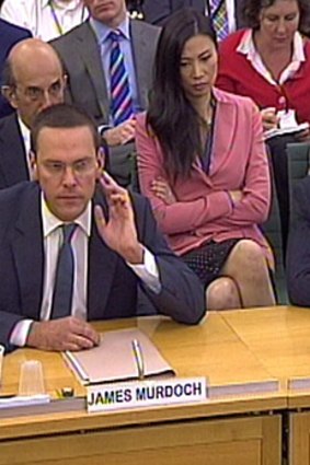 James and Rupert Murdoch at a parliamentary committee hearing in London.