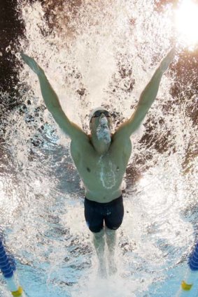 Phelps swims to victory.