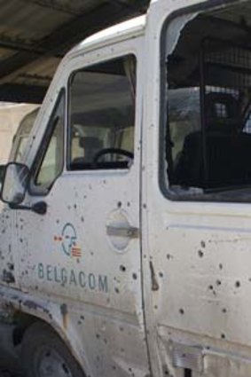 A bullet-riddled vehicle in Damascus.