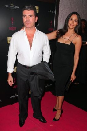 Chest nut: Simon Cowell and Lauren Silverman at the opening of London Cabaret Club in May.