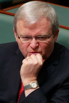 To the backbench ... Kevin Rudd during question time after he was defeated in the leadership ballot.