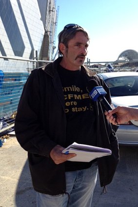 CFMEU boss Mick Buchan talks to the press at the Perth Arena.