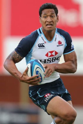 Israel Folau of the Waratahs runs in for his second try of the game.