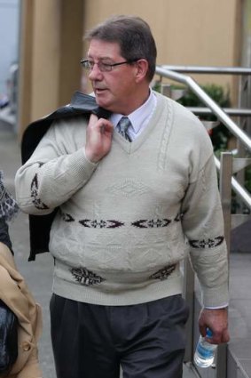 Raymond Harrison, business partner of David Monlun, leaves the Glebe Coroner's Court.
