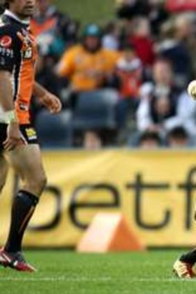 Up and running: Lote Tuqiri in action for Wests Tigers.
