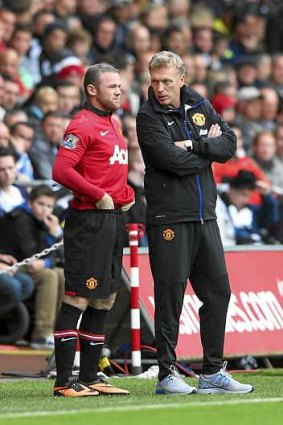 Unsettled: Man United manager David Moyes with Wayne Rooney