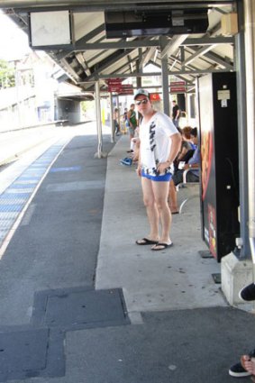 Beating the heat ... commuters go pants free.