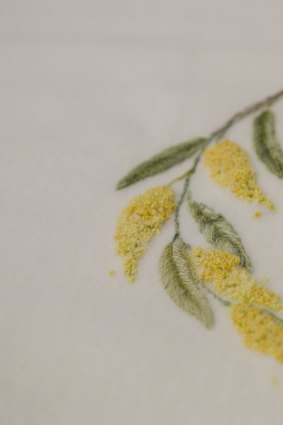 The wattle design - created by the ACT Embroiders' Guild - which features on Princess Charlotte's new blanket. 