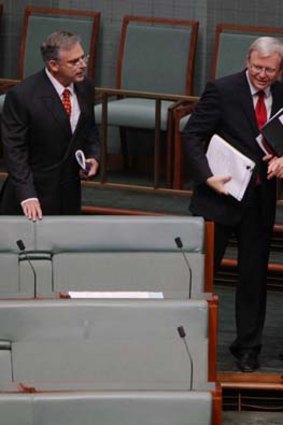 Joel Fitzgibbon shows Kevin Rudd his seat on the backbench.