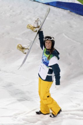 That winning feeling ... Torah Bright salutes the crowd after her second run.
