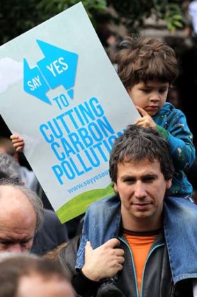 Supporters of the national carbon tax rally outside the Melbourne State Library as part of "Say Yes" week.