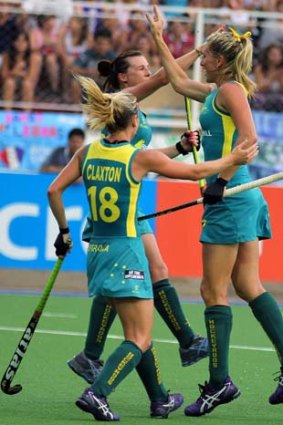 The Hockeyroos celebrate after scoring against England.