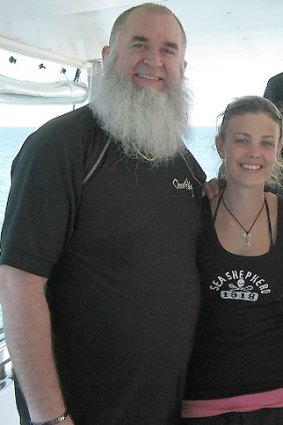 Elyse Frankcom, shortly after her first time back in the water after the attack, with Trevor Burns, the man who helped save her.